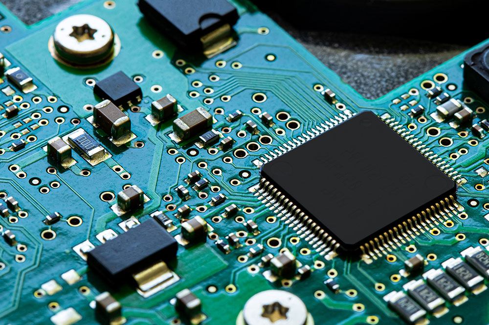 Macro Close up of components and microchips on PC circuit board of Hard Disc Drive